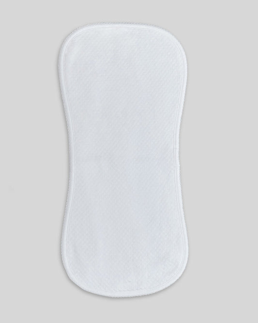 White quilted pima burp cloth for babies, elegant and practical for daily use.